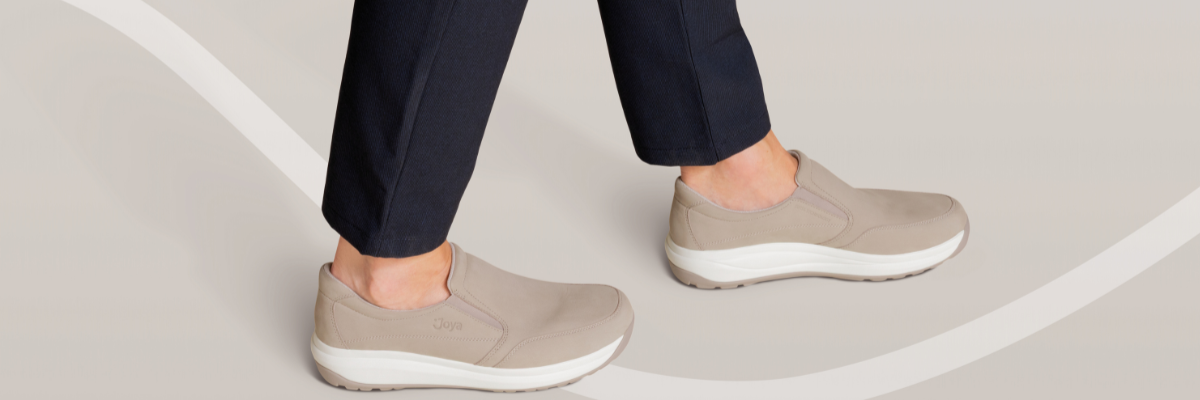 beige slip on shoe on grey background