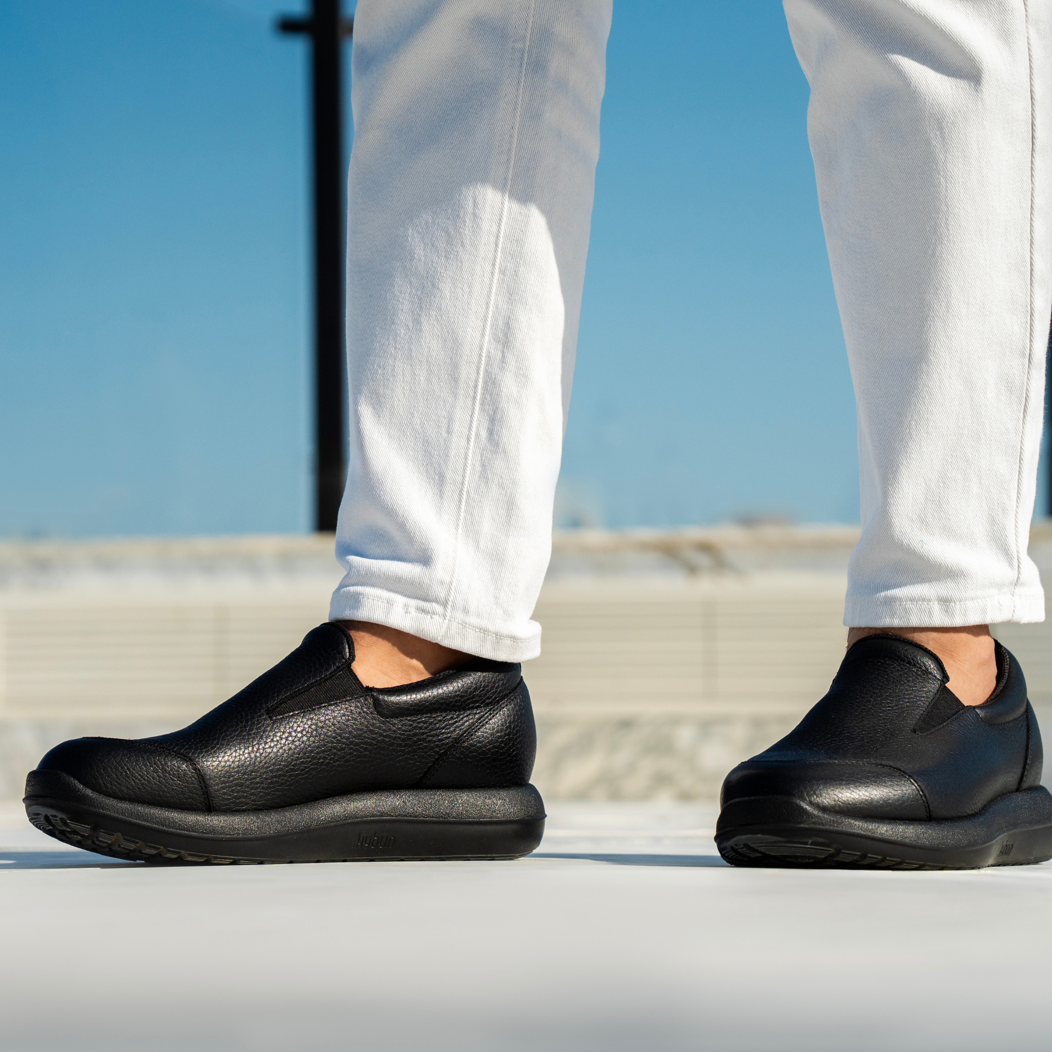 closeup of mens black shoe