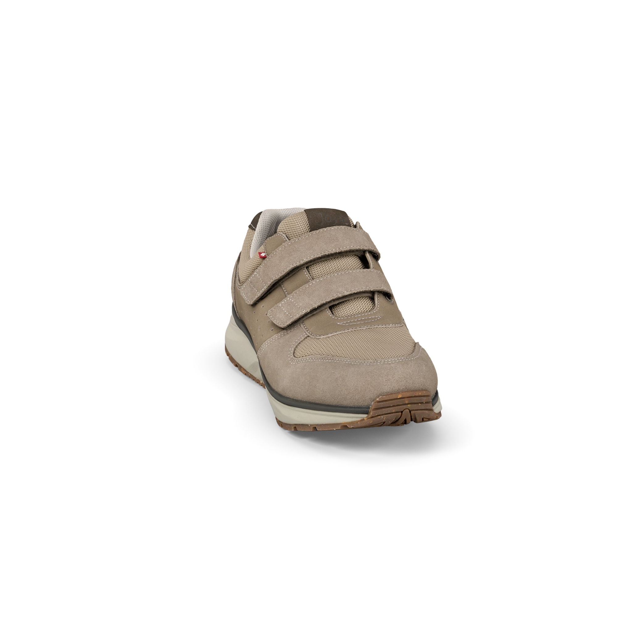 Beige shoe with velcro straps on a white background