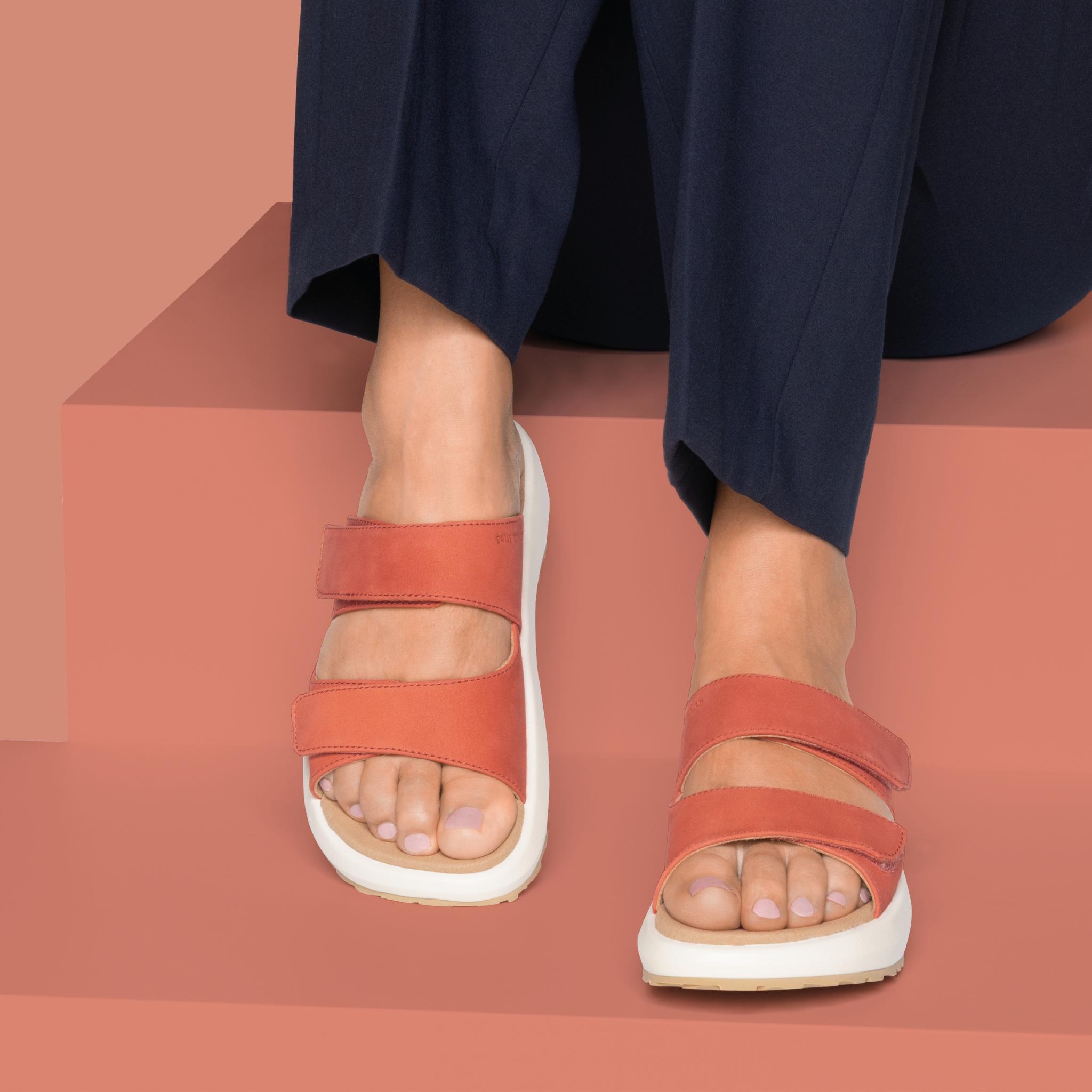 women wearing red sandals