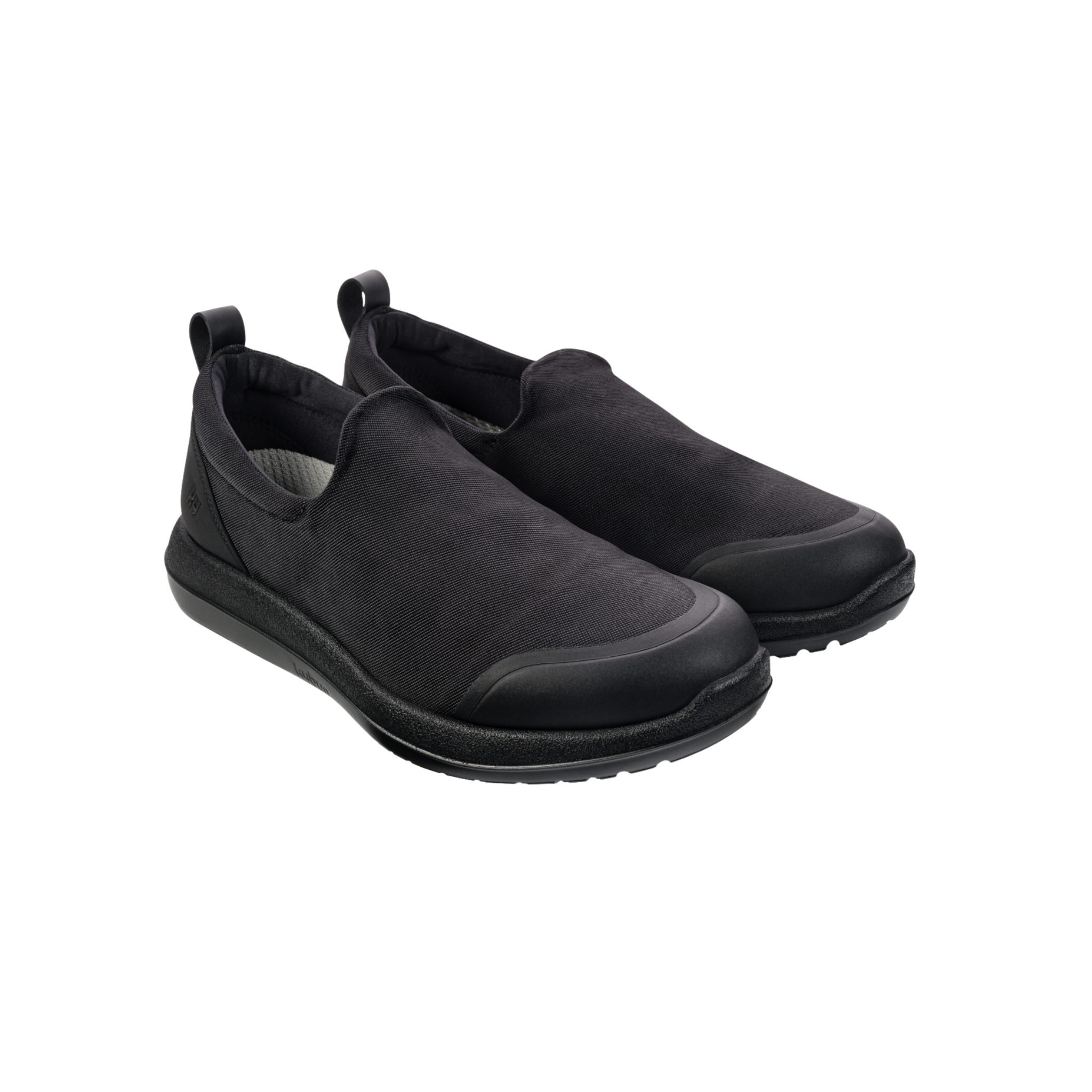 Pair of black slip-on shoes on a white background