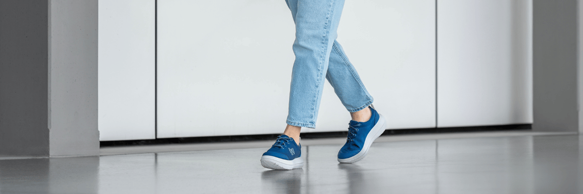 women walking wearing blue kybun sneakers 
