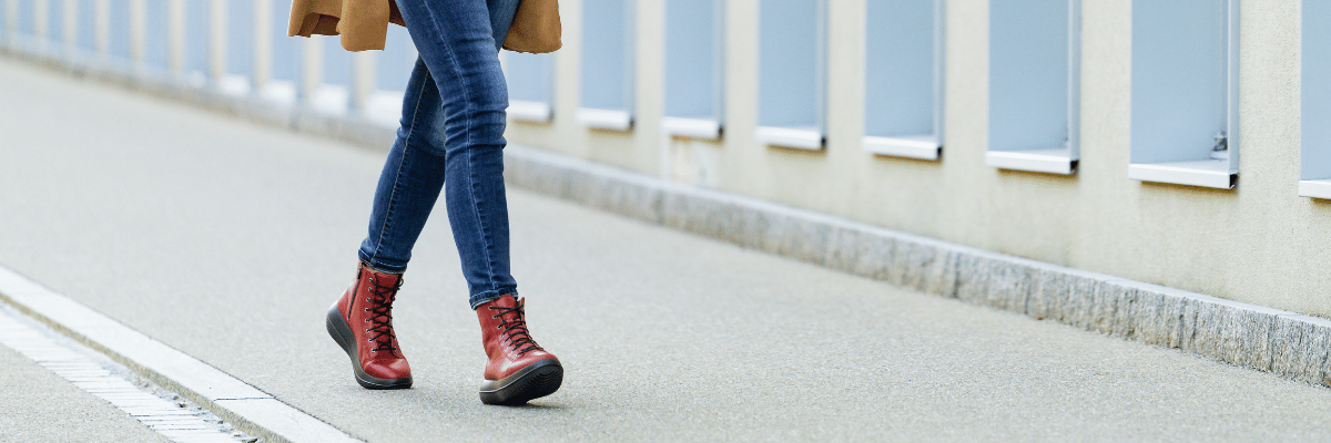 women walking in red kybun boots