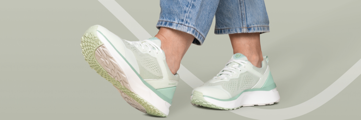 green sneakers on green background
