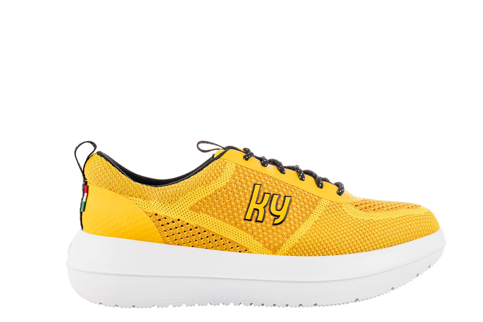 A pair of yellow kybun Meilen Gold shoes with a mesh upper, rubber sole, and distinctive branding on the side.