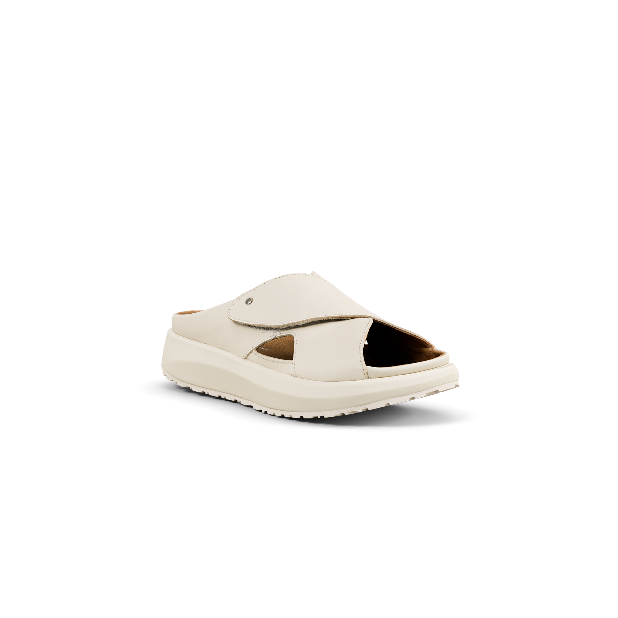 A single cream-colored slip-on sandal with a thick platform sole, shown from a three-quarters angle on a white background.