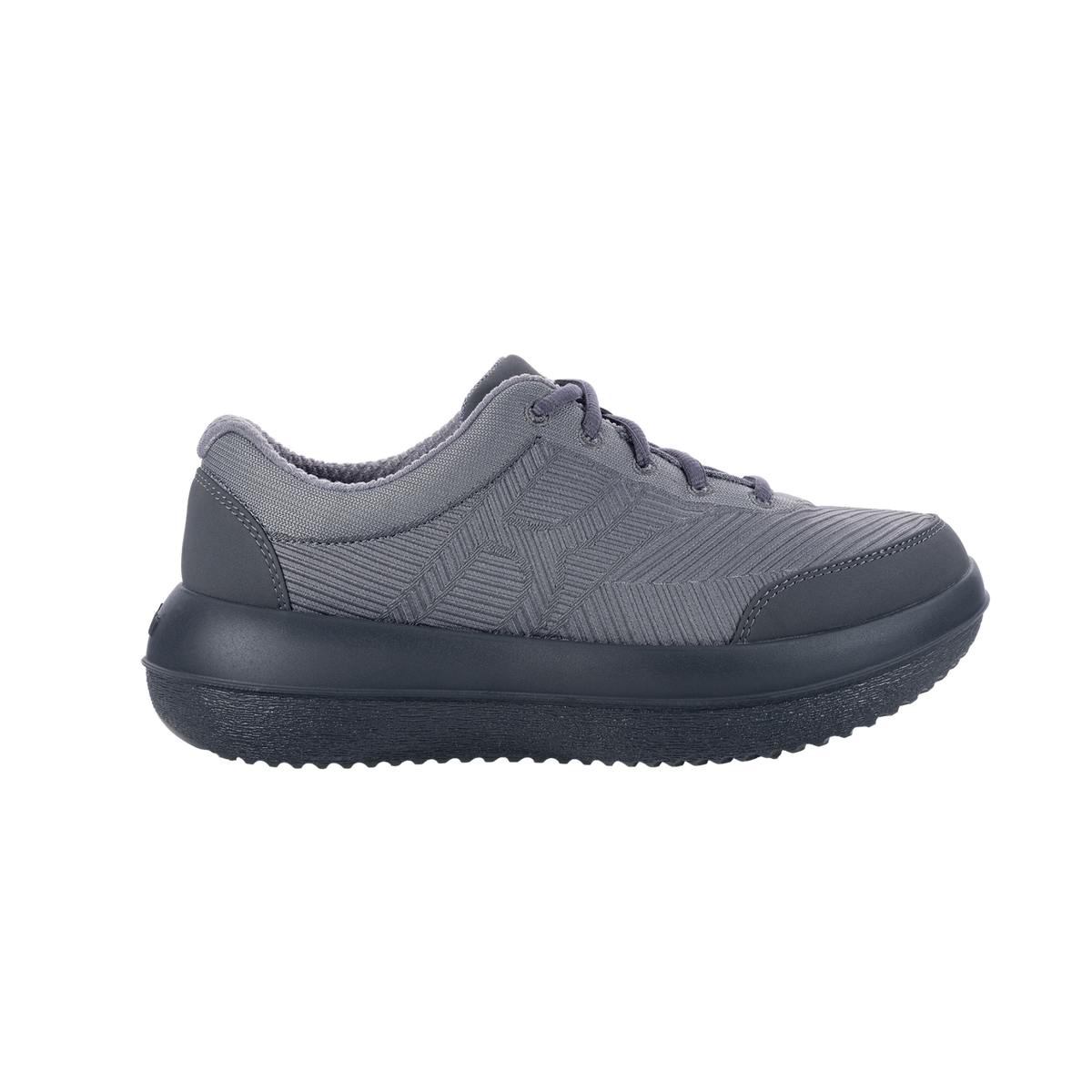 A gray and dark gray slip-on safety shoe with a textured geometric pattern on the side, dark gray laces, and a thick dark gray sole, shown from a side profile on a white background.
