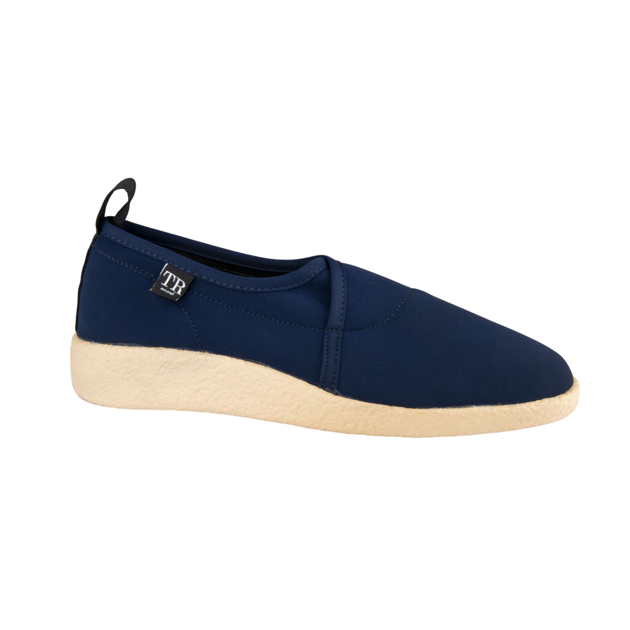 Navy slip-on shoe with a beige sole on a white background