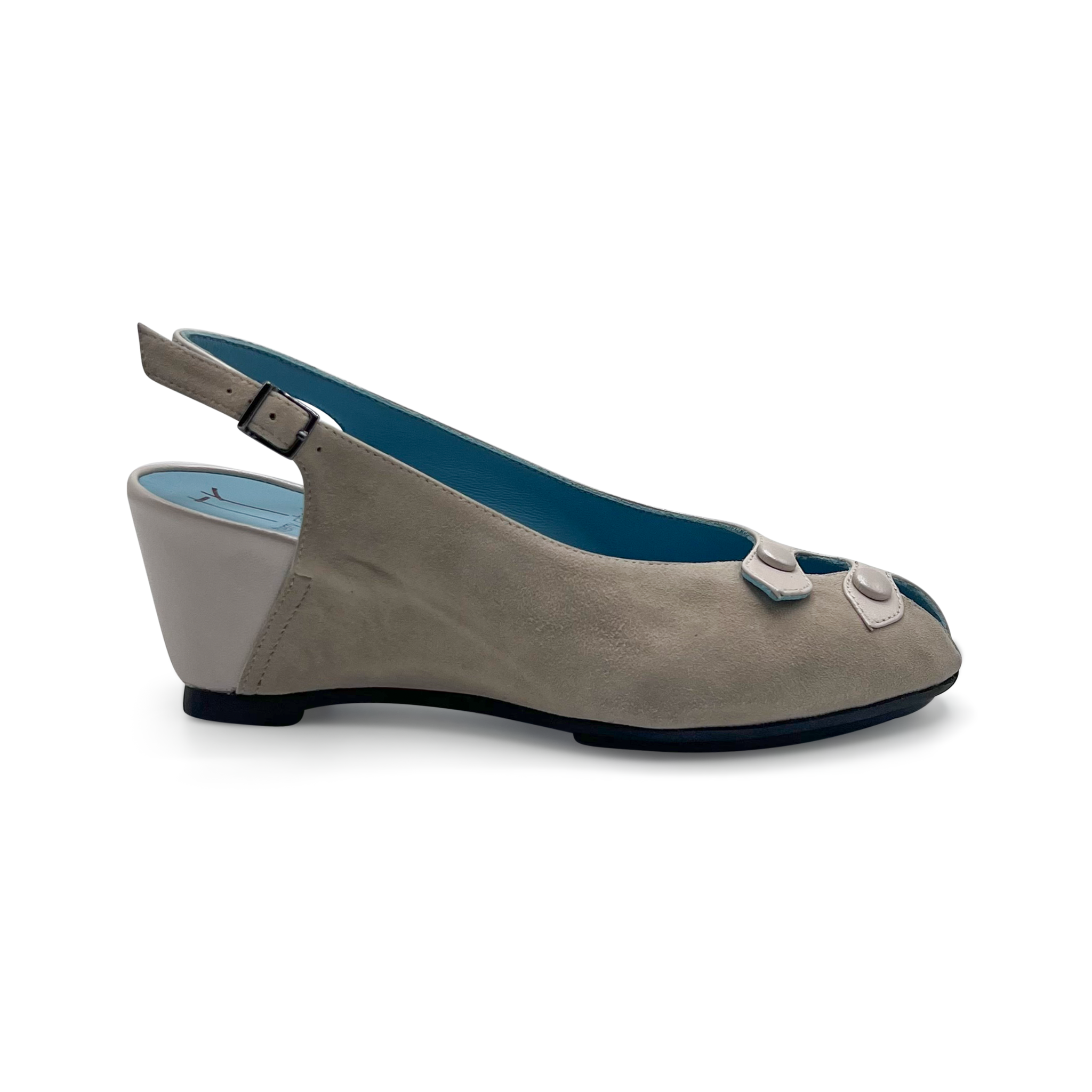Beige wedge sandal with blue interior on a white background
