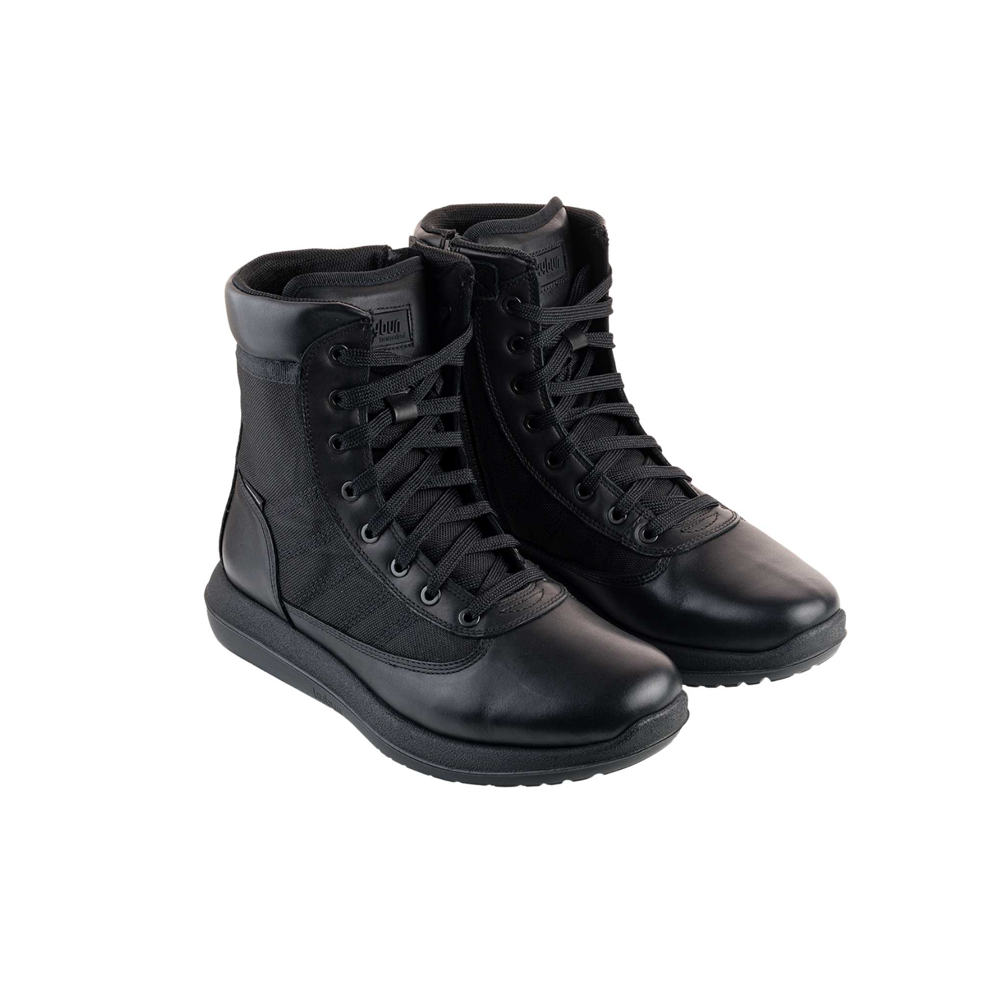 Pair of black high-top boots on a white background
